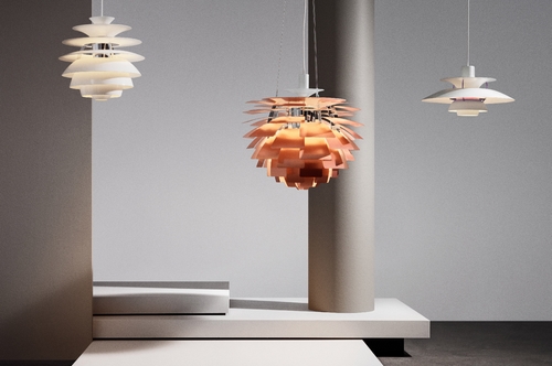 Louis Poulsen pendant lamps glowing over a wooden table